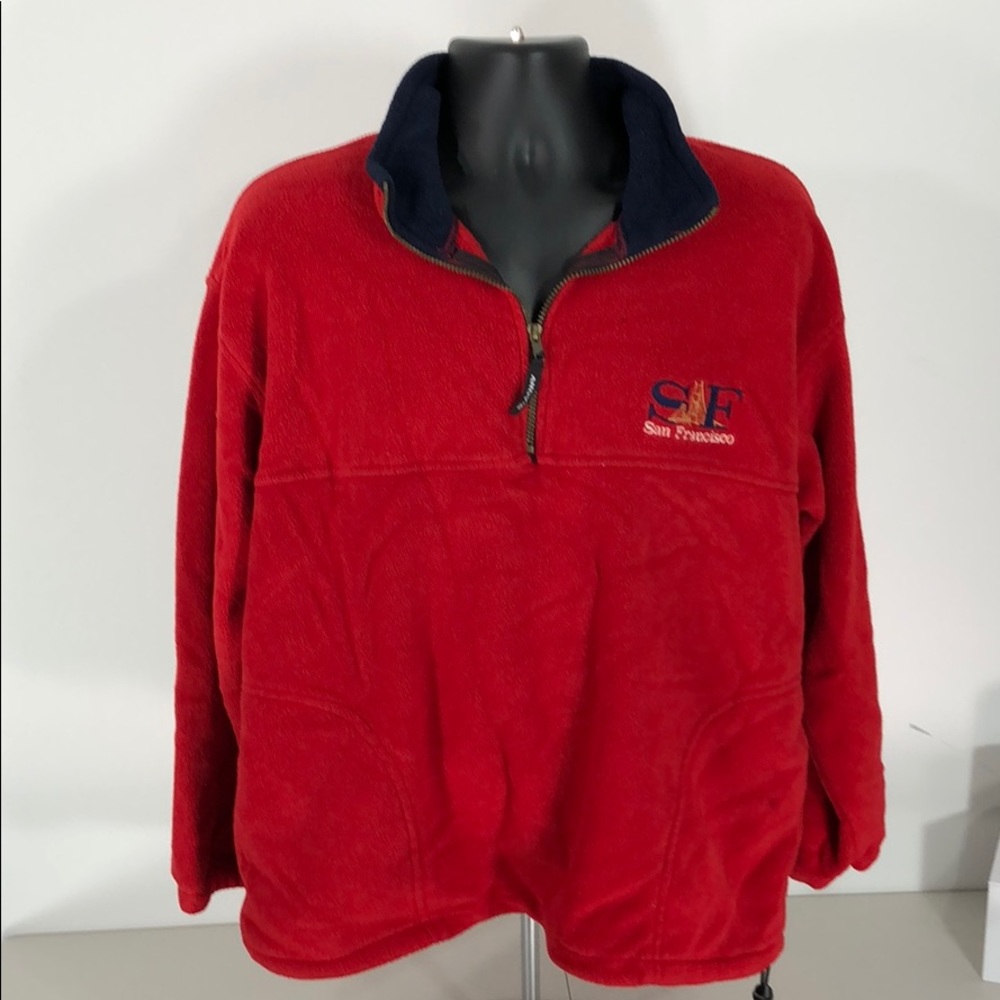 Red quarter zip pullover.